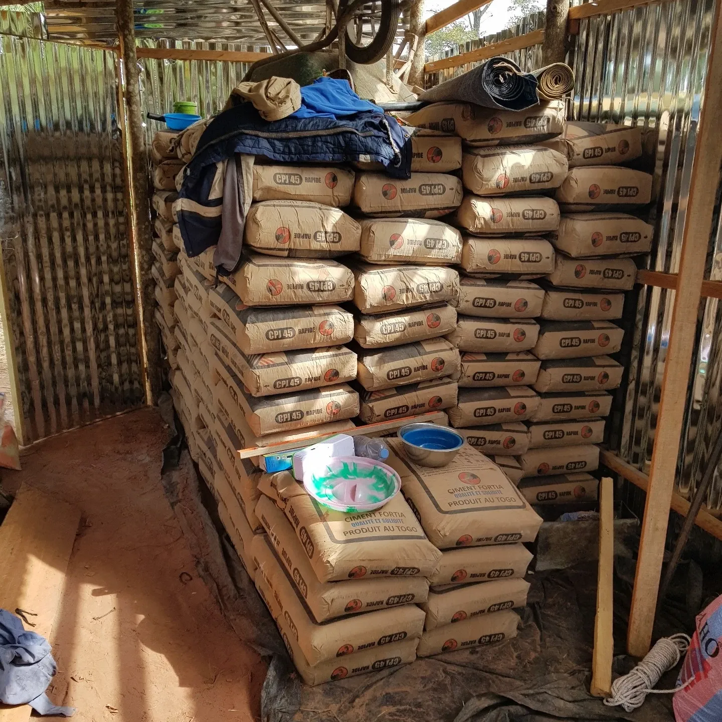 The cement is stored in the storehouse too: 200 bags of 50 kg each, all carried in by hand