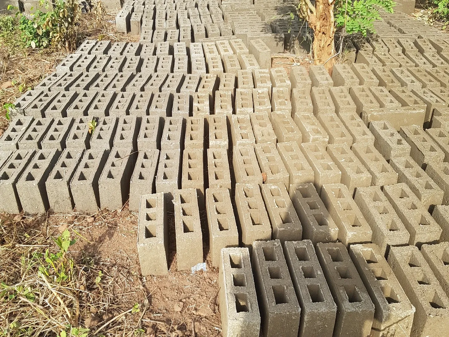 The blocks for the wall are made by hand, production is in full swing